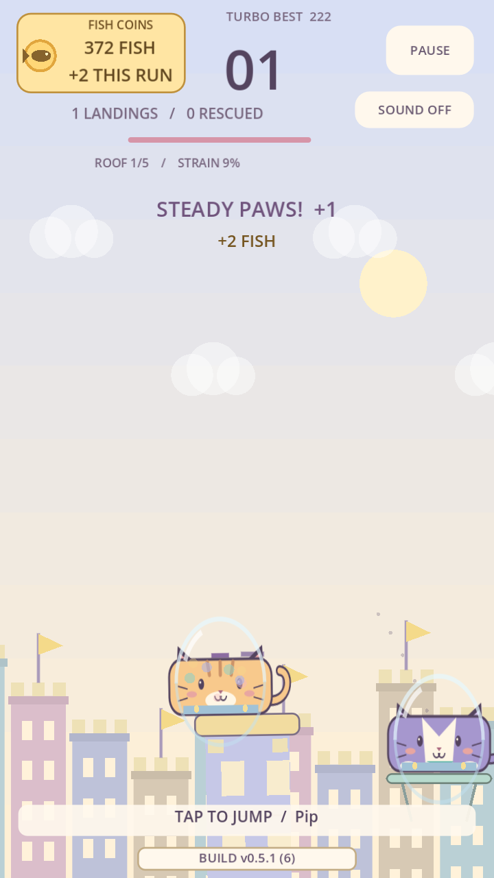 Stacking cats above the rooftops, with the Fish Coins earned this run visible.